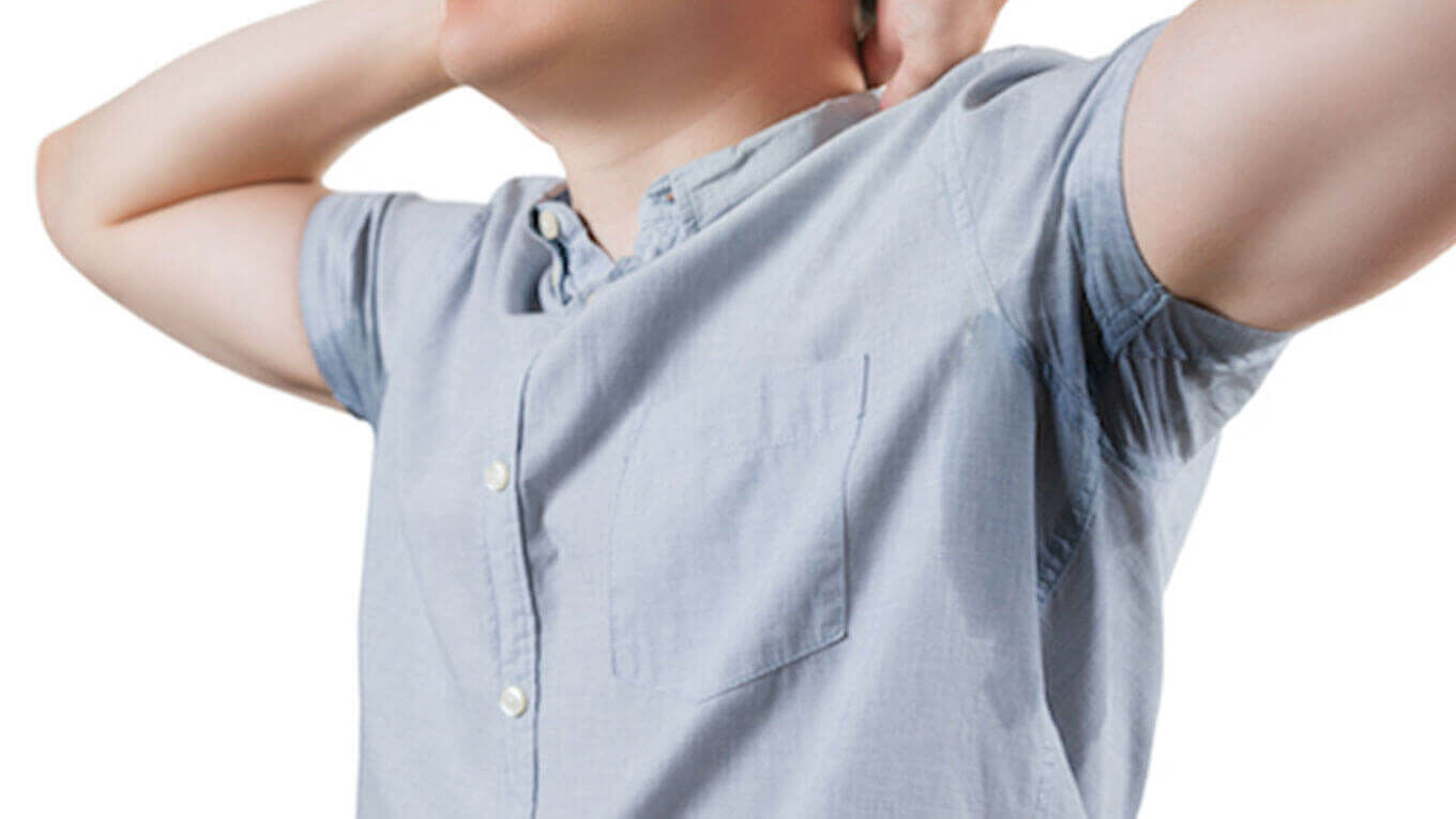 an image of a person with sweaty underarms an image of a person with sweaty underarms