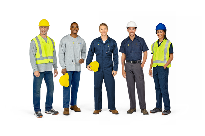 Manufacturing workers wearing Red Kap hi vis and coveralls Manufacturing workers wearing Red Kap hi vis and coveralls